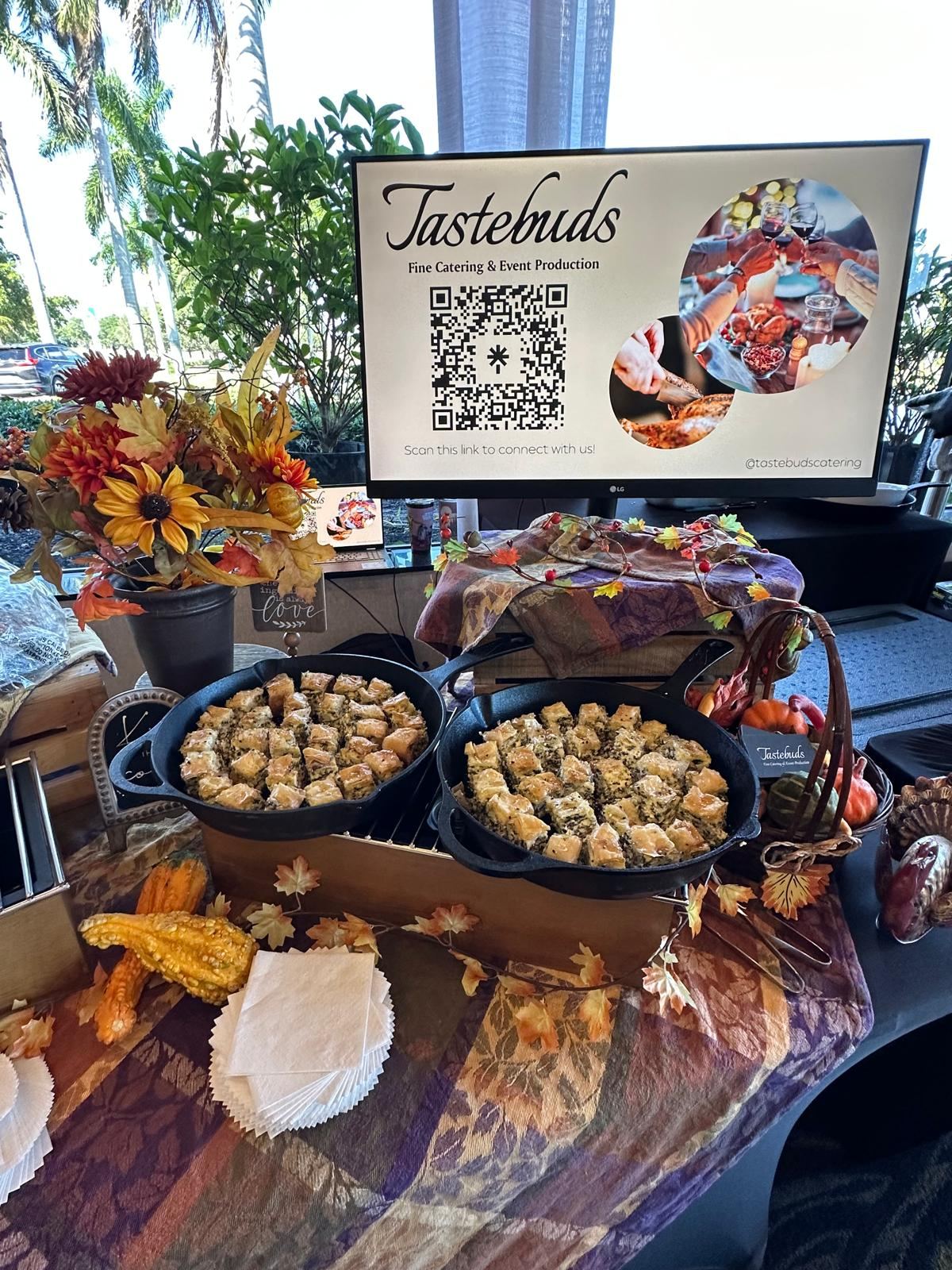 Fall holiday display with cast-iron skillets of spanakopita