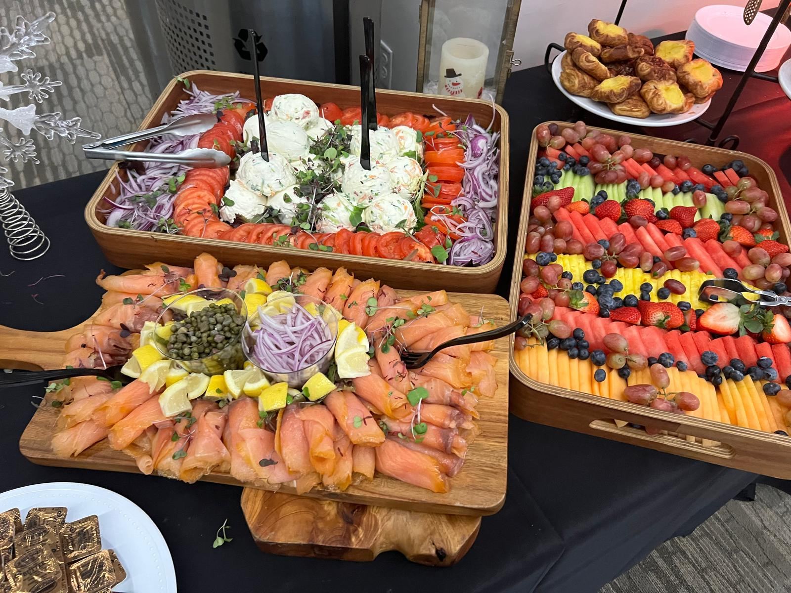 Smoked salmon, cream cheese and fruit display for a morning event